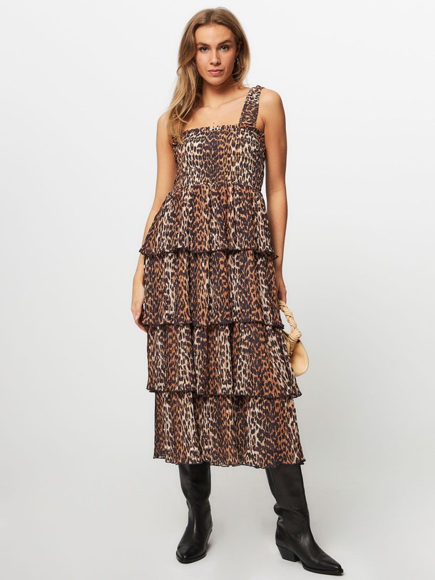 Ontdek de Geweven jurk met dessin van Ganni in de kleur camel bij Orangebag. Op werkdagen voor 21:45 besteld, morgen in huis.