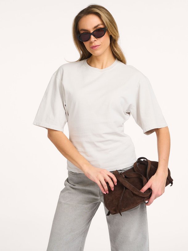 Ontdek de Storey katoenen T-shirt van Agolde in de kleur Lichtgrijs bij Orangebag. Op werkdagen voor 21:45 besteld, morgen in huis.