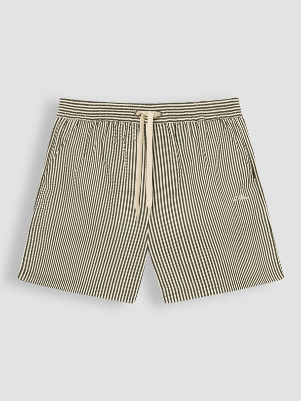 Ontdek de Stan geweven seersucker zwembroek van Les Deux in de kleur olijfgroen bij Orangebag. Op werkdagen voor 21:45 besteld, morgen in huis.