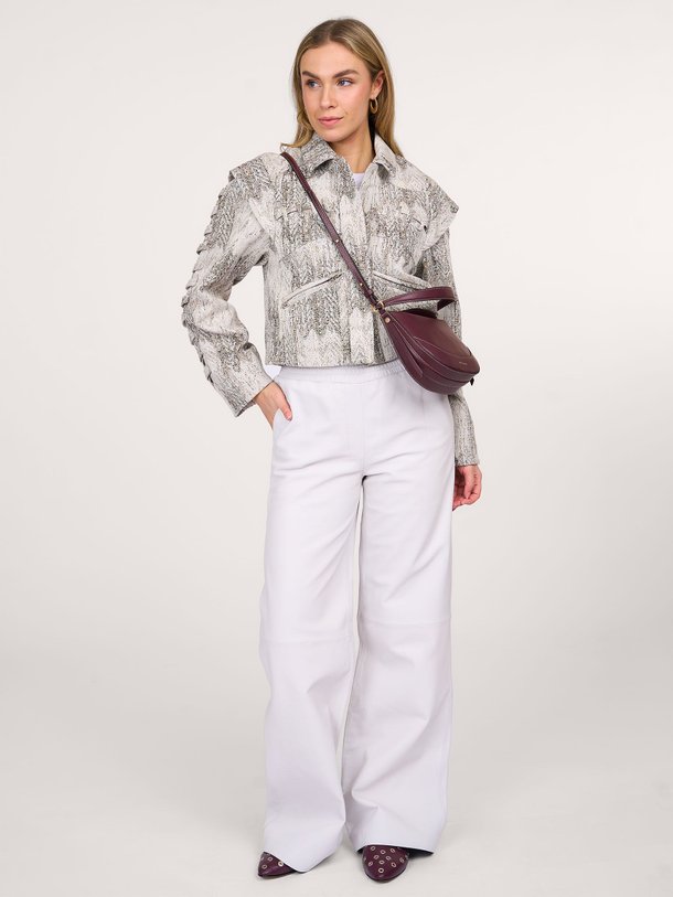 Ontdek de Pariso lederen wide leg broek van Dna in de kleur off-white bij Orangebag. Op werkdagen voor 21:45 besteld, morgen in huis.