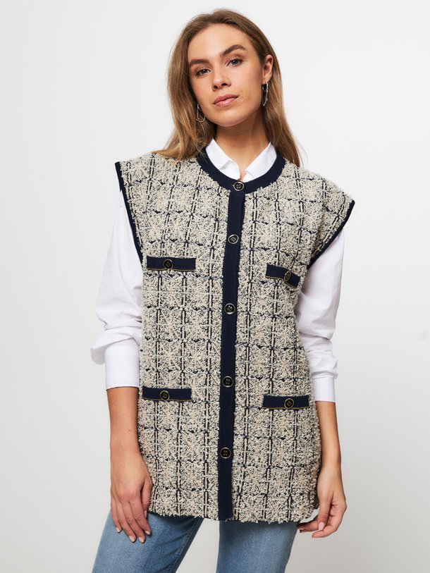 Ontdek de Cadi wolmix bouclé vest met dessin van Mes Demoiselles in de kleur ecru bij Orangebag. Op werkdagen voor 21:45 besteld, morgen in huis.