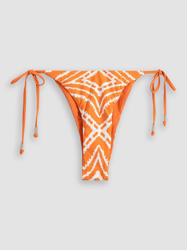 Ontdek de Zanzibar Tie Side Rio reversible van Seafolly in de kleur oranje bij Orangebag. Op werkdagen voor 21:45 besteld, morgen in huis.