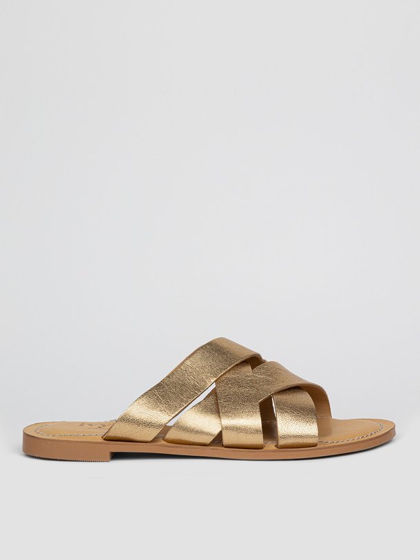 Ontdek de Nova lederen metallic slippers van Ivylee Copenhagen in de kleur goudkleur bij Orangebag. Op werkdagen voor 21:45 besteld, morgen in huis.