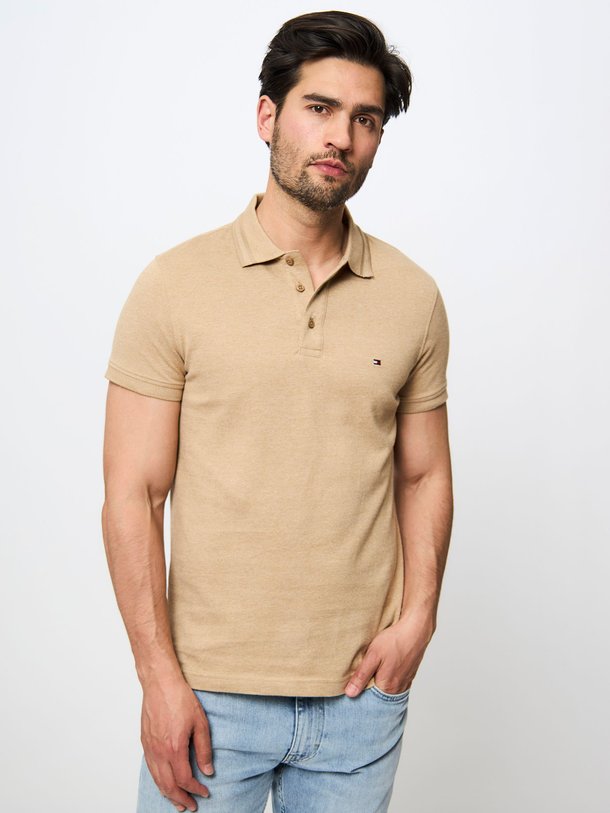 Ontdek de Pretwist katoenen gemêleerde polo van Tommy Hilfiger in de kleur lichtbruin bij Orangebag. Op werkdagen voor 21:45 besteld, morgen in huis.