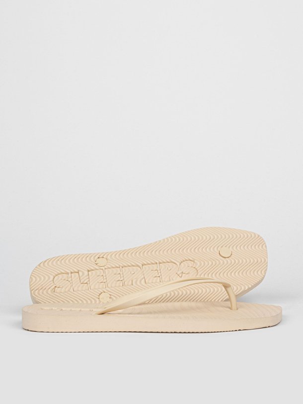 Ontdek de Tapered rubberen slippers van Sleepers in de kleur crème bij Orangebag. Op werkdagen voor 21:45 besteld, morgen in huis.