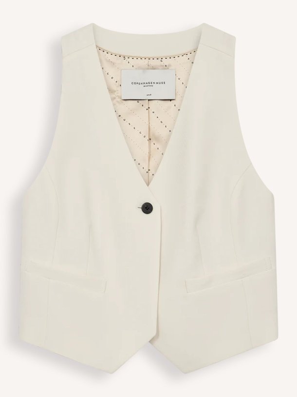 Ontdek de Tailor viscosemix gilet van Copenhagen Muse in de kleur ecru bij Orangebag. Op werkdagen voor 21:45 besteld, morgen in huis.