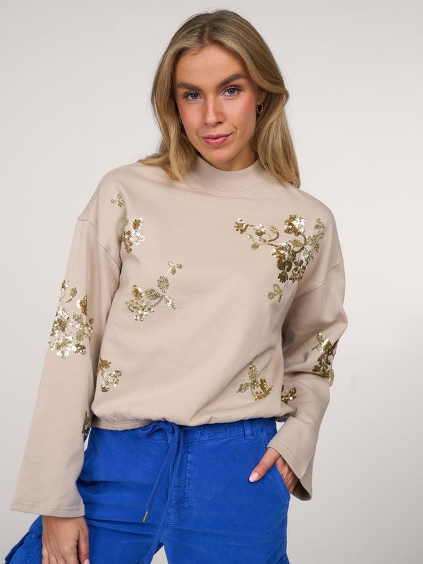 Ontdek de Katoenmix trui met pailletten van Summum in de kleur beige bij Orangebag. Op werkdagen voor 21:45 besteld, morgen in huis.