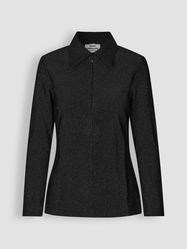 Ontdek de Gideon viscosemix stretch top met lurex van Mads Norgaard in de kleur zwart bij Orangebag. Op werkdagen voor 21:45 besteld, morgen in huis.