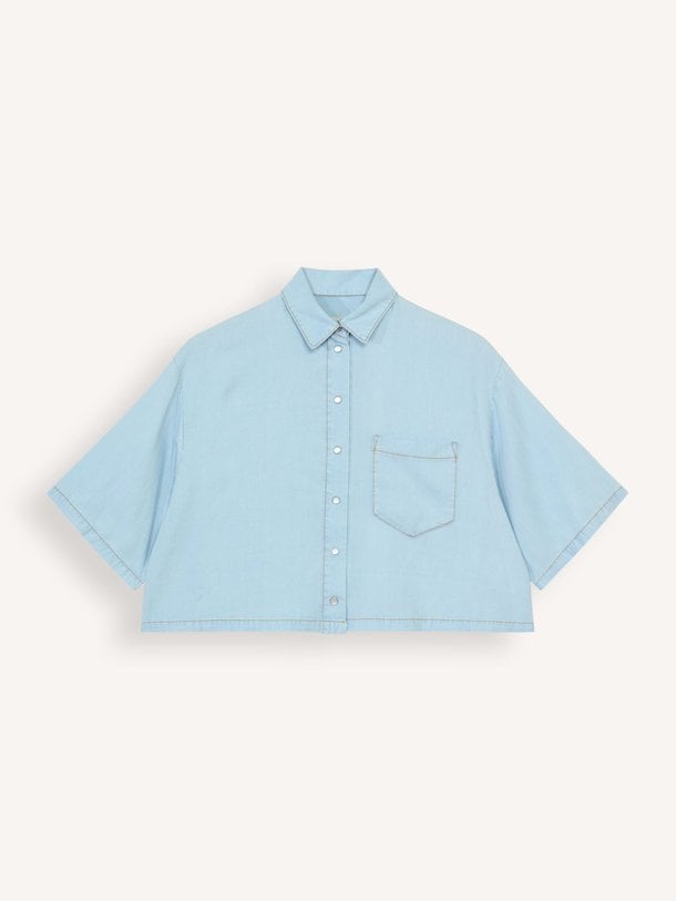 Semicouture Denim Blouse - Lichtblauw Ontdek de Denim blouse van Semicouture in de kleur lichtblauw bij Orangebag. Op werkdagen voor 21:45 besteld, morgen in huis.
