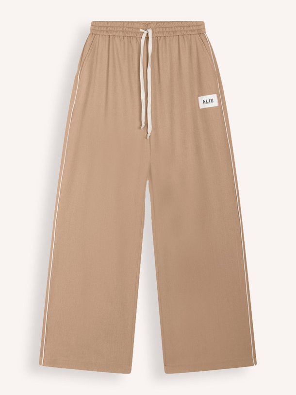 Ontdek de Viscosemix relaxed fit broek van Alix The Label in de kleur Camel bij Orangebag. Op werkdagen voor 21:45 besteld, morgen in huis.