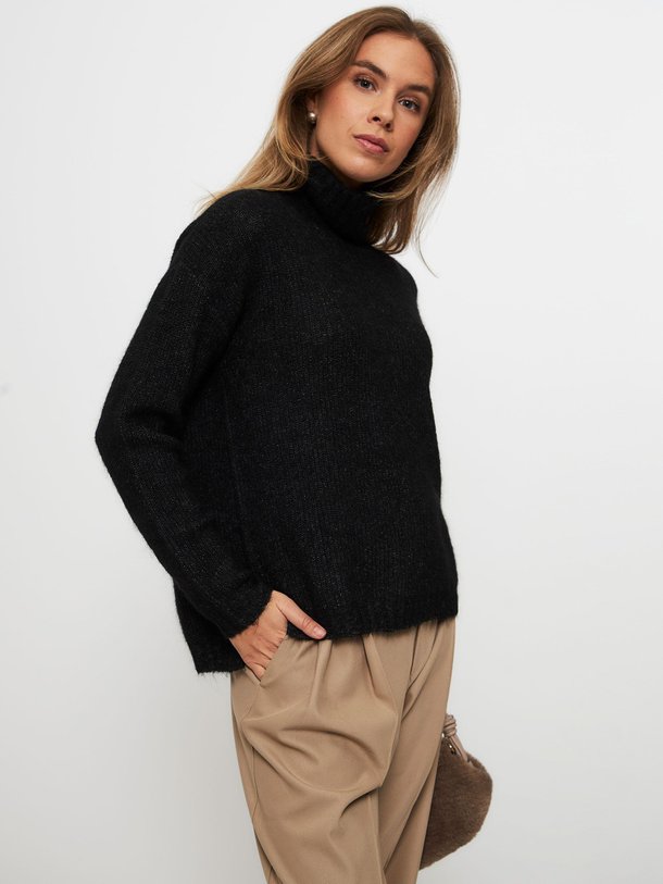 Ontdek de Wolmix gemêleerde coltrui van My Essential Wardrobe in de kleur zwart bij Orangebag. Op werkdagen voor 21:45 besteld, morgen in huis.