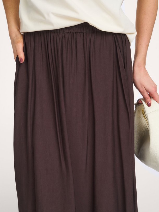 Co'Couture Sunrise viscosemix rok - Donkerbruin Ontdek de Sunrise viscosemix rok van Co'Couture in de kleur Donkerbruin bij Orangebag. Op werkdagen voor 21:45 besteld, morgen in huis.