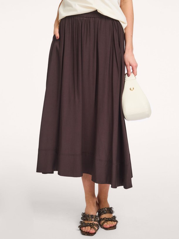 Co'Couture Sunrise viscosemix rok - Donkerbruin Ontdek de Sunrise viscosemix rok van Co'Couture in de kleur Donkerbruin bij Orangebag. Op werkdagen voor 21:45 besteld, morgen in huis.