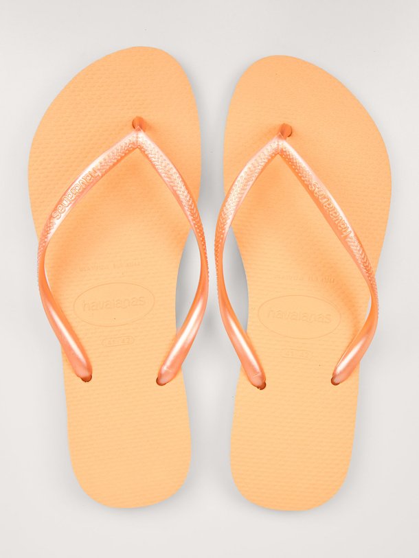 Ontdek de Slim teenslippers van Havaianas in de kleur perzik bij Orangebag. Op werkdagen voor 21:45 besteld, morgen in huis.