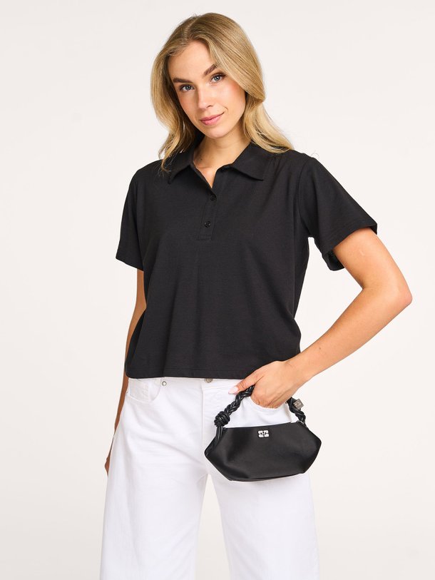 Ontdek de Abby katoenmix polo top van My Essential Wardrobe in de kleur zwart bij Orangebag. Op werkdagen voor 21:45 besteld, morgen in huis.
