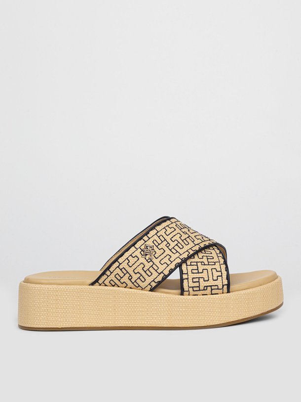 Ontdek de Raffia plateau logo slippers van Tommy Hilfiger in de kleur crème bij Orangebag. Op werkdagen voor 21:45 besteld, morgen in huis.