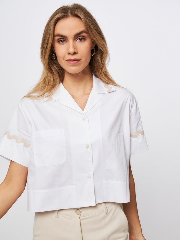Ontdek de Girlette katoenen blouse van Laurence Bras in de kleur wit bij Orangebag. Op werkdagen voor 21:45 besteld, morgen in huis.
