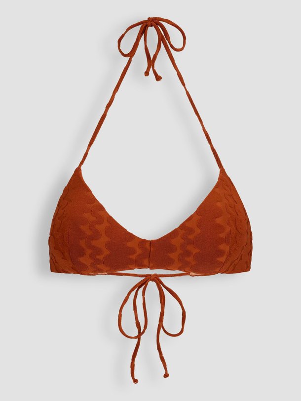 Ontdek de Bikinitop met dessin van OAS in de kleur terracotta bij Orangebag. Op werkdagen voor 21:45 besteld, morgen in huis.