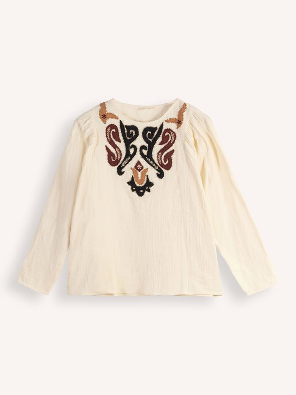 Ontdek de Debrah katoenen blouse met borduursel van Louizon in de kleur crème bij Orangebag. Op werkdagen voor 21:45 besteld, morgen in huis.