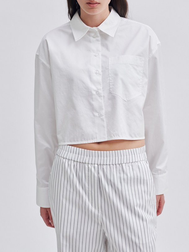 Ontdek de Charm katoenen cropped blouse van Second Female in de kleur wit bij Orangebag. Op werkdagen voor 21:45 besteld, morgen in huis.