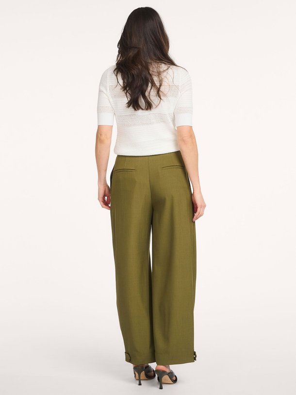 Ontdek de Jarts viscosemix polo top van Essentiel Antwerp in de kleur Off-white bij Orangebag. Op werkdagen voor 21:45 besteld, morgen in huis.
