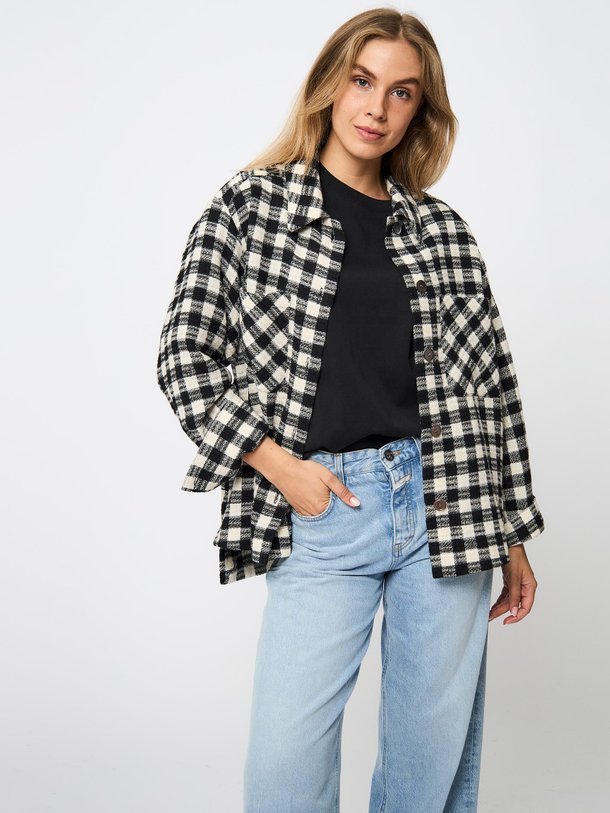 Ontdek de Melva wol/katoenmix oversized blouse van Ruby Tuesday in de kleur zwart bij Orangebag. Op werkdagen voor 21:45 besteld, morgen in huis.