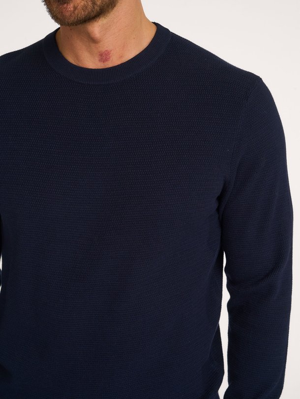 Ontdek de Organic cotton trui met structuur van Profuomo in de kleur donkerblauw bij Orangebag. Op werkdagen voor 21:45 besteld, morgen in huis.