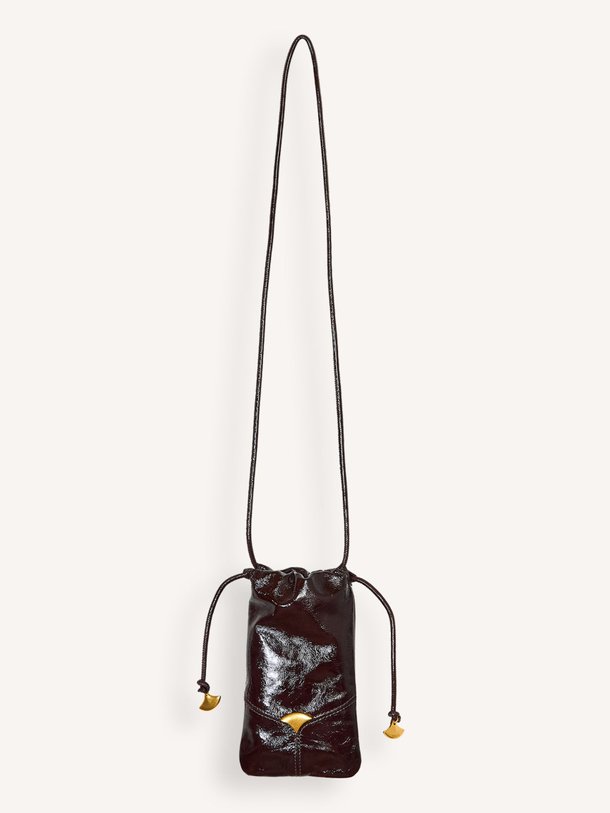 Ontdek de Divio laklederen telefoontas van Sessun in de kleur Donkerbruin bij Orangebag. Op werkdagen voor 21:45 besteld, morgen in huis.