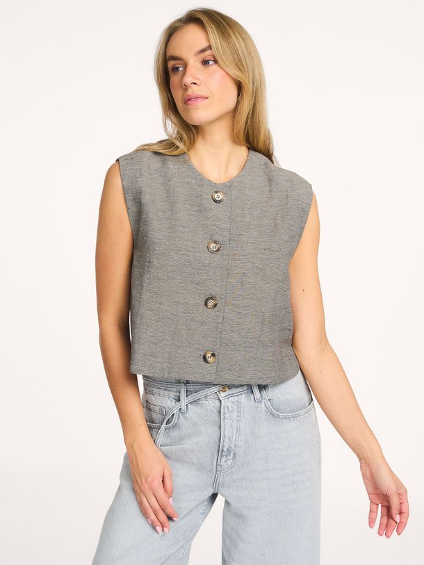 Ontdek de Nori katoenmix gilet van By-Bar in de kleur Donkergrijs bij Orangebag. Op werkdagen voor 21:45 besteld, morgen in huis.