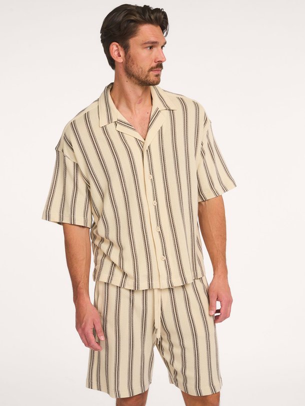 Ontdek de Basiil katoenen gestreept overhemd van Drykorn in de kleur Off-white bij Orangebag. Op werkdagen voor 21:45 besteld, morgen in huis.