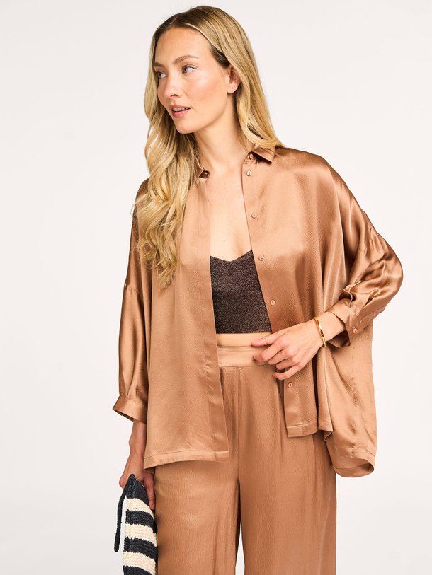 Ontdek de Manon zijden blouse van Karma Koma in de kleur koper bij Orangebag. Op werkdagen voor 21:45 besteld, morgen in huis.