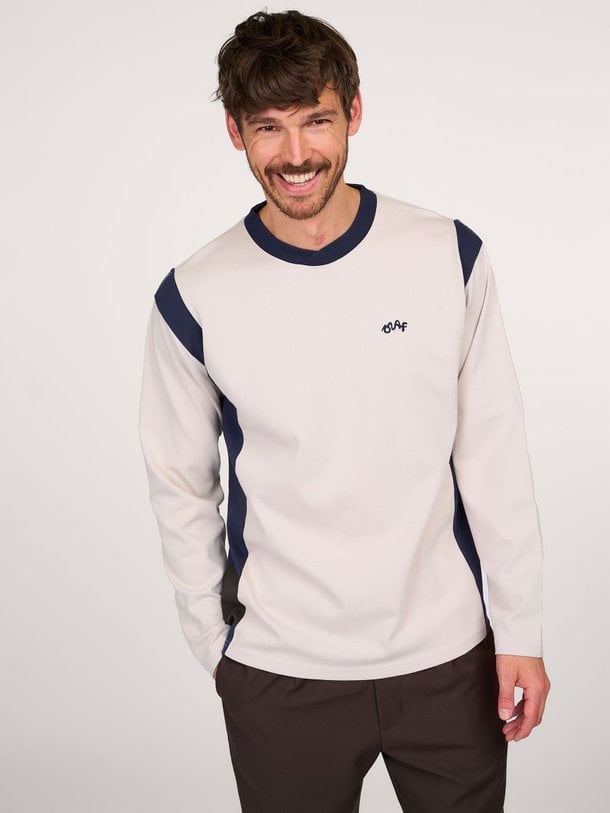 Ontdek de Panel Tee katoenen longsleeve van OLAF in de kleur zand bij Orangebag. Op werkdagen voor 21:45 besteld, morgen in huis.