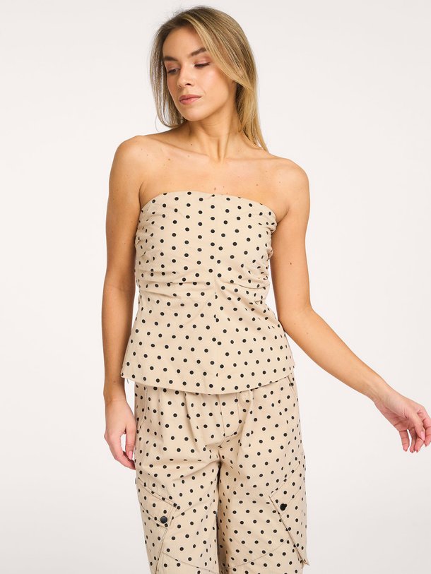Ontdek de Diddi katoenen strapless top met stippen van Co'Couture in de kleur Beige bij Orangebag. Op werkdagen voor 21:45 besteld, morgen in huis.