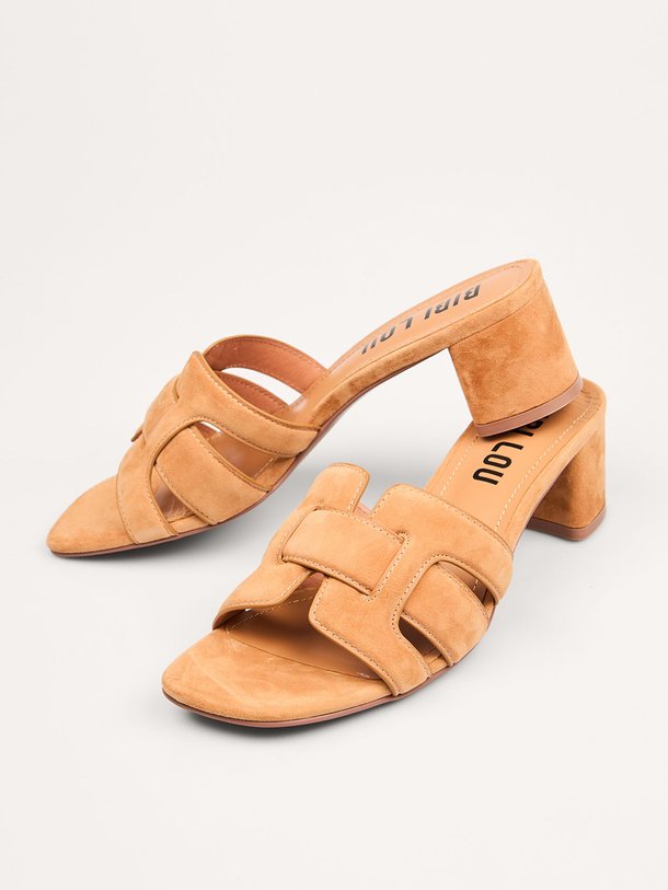 Ontdek de Holly suède muiltjes van Bibi Lou in de kleur Camel bij Orangebag. Op werkdagen voor 21:45 besteld, morgen in huis.