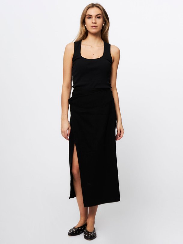 Ontdek de Linnenmix overslagrok van Les Coyotes de Paris in de kleur zwart bij Orangebag. Op werkdagen voor 21:45 besteld, morgen in huis.