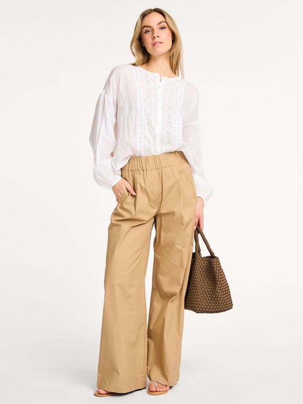 Ontdek de Benji katoenen poplin wide leg broek van By-Bar in de kleur camel bij Orangebag. Op werkdagen voor 21:45 besteld, morgen in huis.