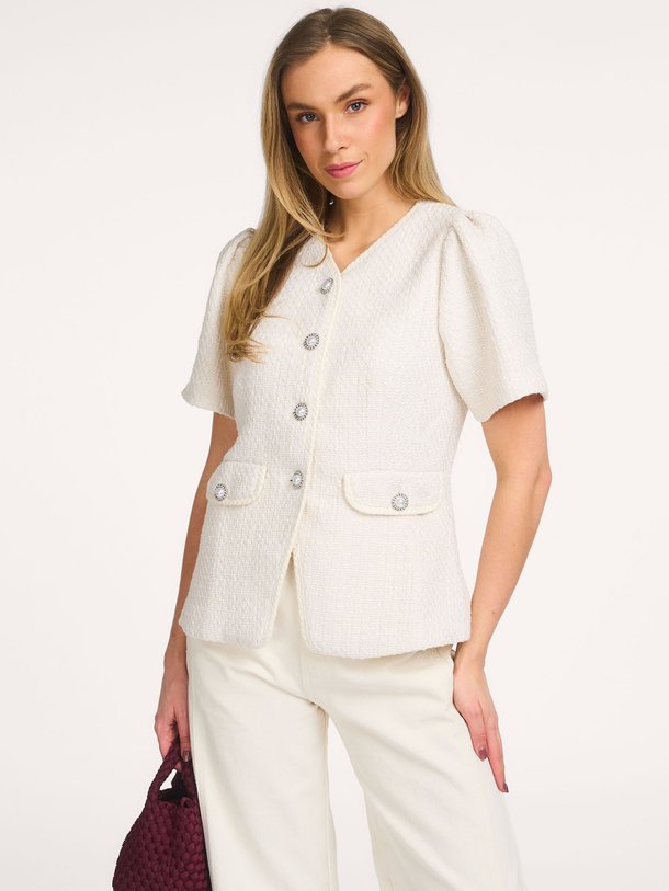 Ontdek de Faina katoenmix bouclé jasje van Neo Noir in de kleur Off-white bij Orangebag. Op werkdagen voor 21:45 besteld, morgen in huis.