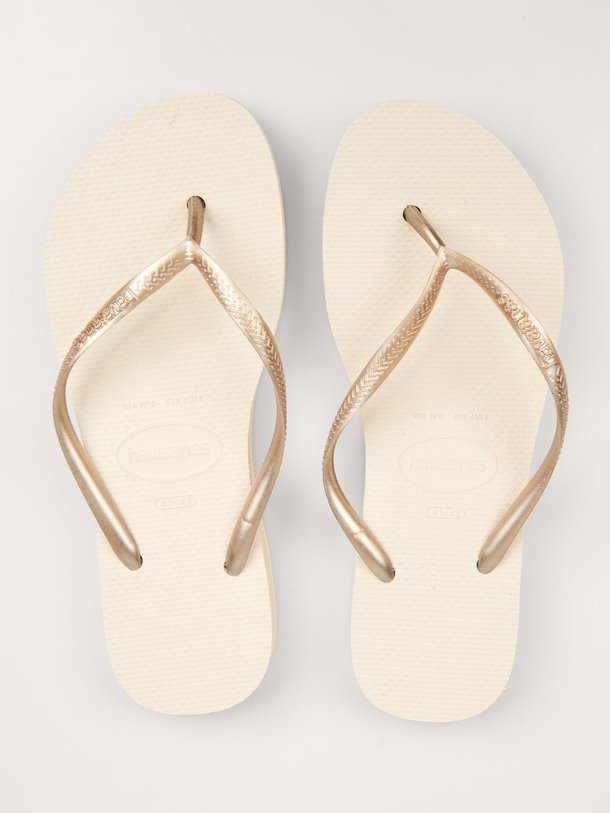Ontdek de Slim Flatform teenslippers van Havaianas in de kleur beige bij Orangebag. Op werkdagen voor 21:45 besteld, morgen in huis.