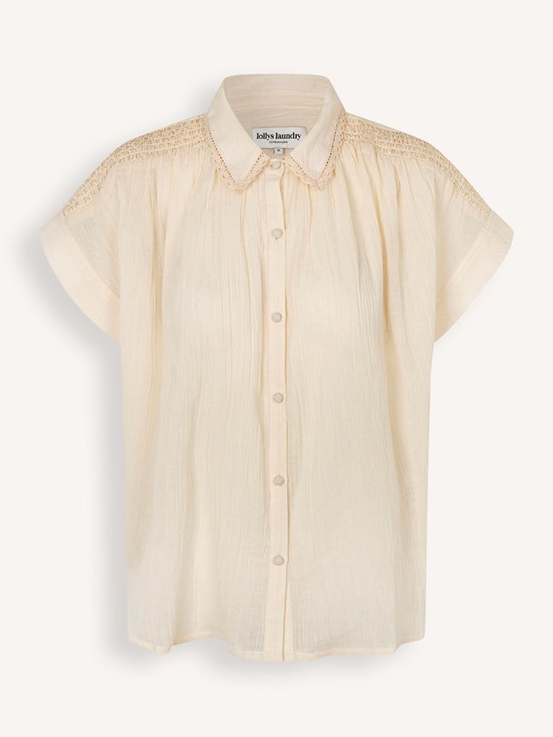 Ontdek de Badal katoenen blouse van Lollys Laundry in de kleur Crème bij Orangebag. Op werkdagen voor 21:45 besteld, morgen in huis.