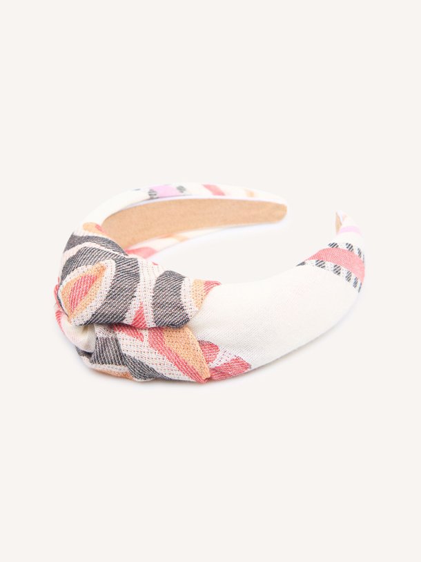 Ontdek de Katoenen haarband met dessin van Devotion in de kleur off-white bij Orangebag. Op werkdagen voor 21:45 besteld, morgen in huis.