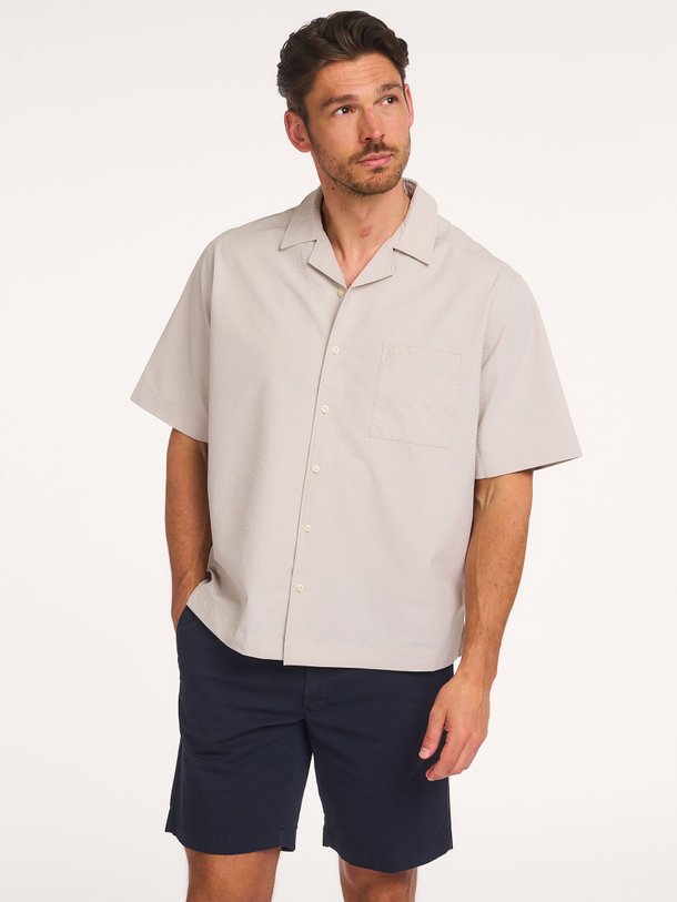 Ontdek de Lapisy, geweven seersucker overhemd van Boss bij Orangebag. Op werkdagen voor 21:45 besteld, morgen in huis.