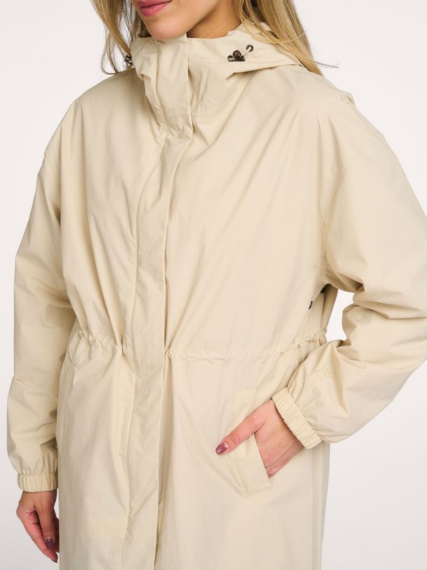Ontdek de Roomy Long Tube geweven technische parka van Welter Shelter in de kleur Beige bij Orangebag. Op werkdagen voor 21:45 besteld, morgen in huis.
