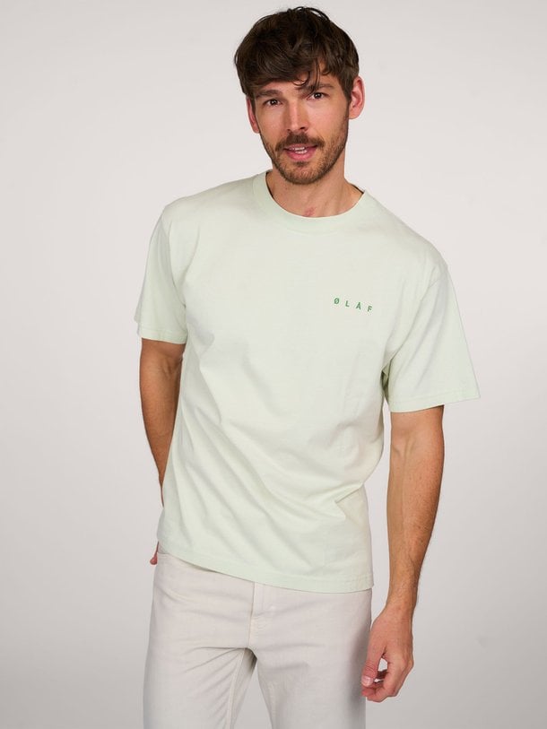 Ontdek de Spiral Face katoenen T-shirt met print van OLAF in de kleur groen bij Orangebag. Op werkdagen voor 21:45 besteld, morgen in huis.