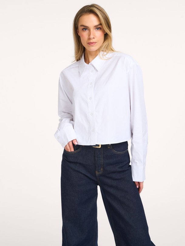 Ontdek de York organic cotton cropped blouse van Gestuz in de kleur Wit bij Orangebag. Op werkdagen voor 21:45 besteld, morgen in huis.