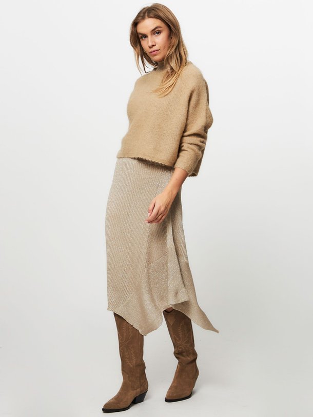 Ontdek de Wave viscosemix rib rok met lurex van Alchemist in de kleur champagne bij Orangebag. Op werkdagen voor 21:45 besteld, morgen in huis.