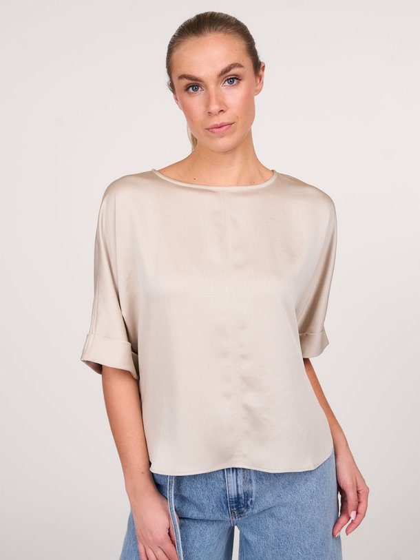 Ontdek de Geweven top van Zenggi in de kleur lichtgrijs bij Orangebag. Op werkdagen voor 21:45 besteld, morgen in huis.