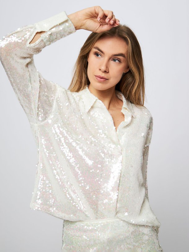 Ontdek de Bonbon geweven pailletten blouse van Dante 6 in de kleur off-white bij Orangebag. Op werkdagen voor 21:45 besteld, morgen in huis.