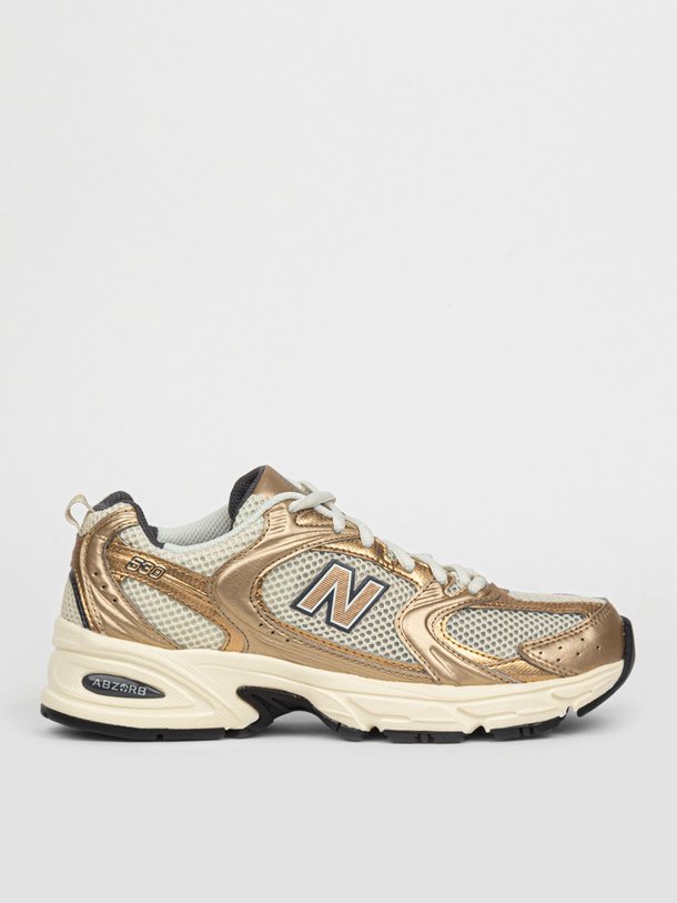 Ontdek de MR530 lederen sneakers met mesh van New Balance in de kleur goudkleur bij Orangebag. Op werkdagen voor 21:45 besteld, morgen in huis.
