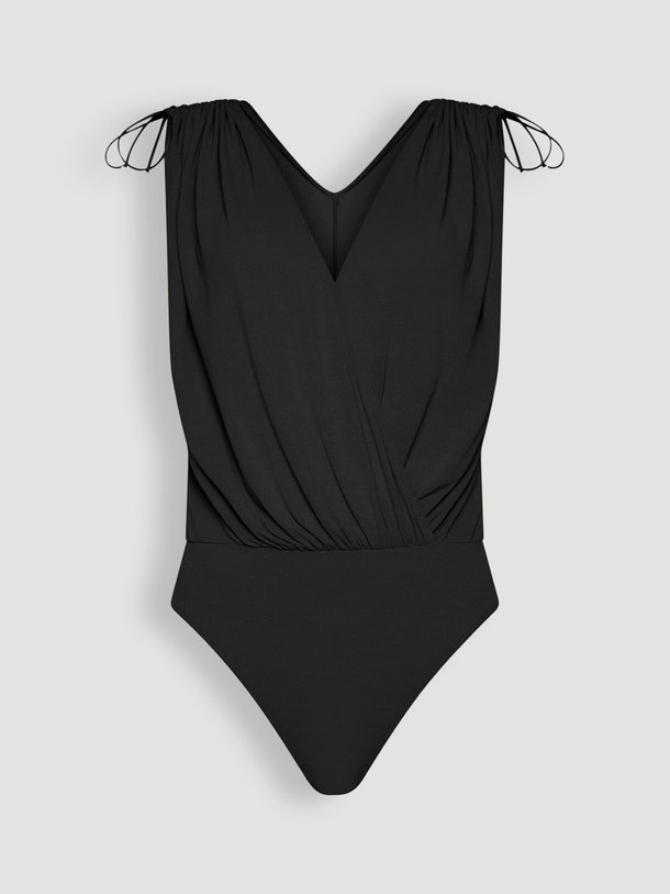 Ontdek de Viscosemix body van Wolford in de kleur zwart bij Orangebag. Op werkdagen voor 21:45 besteld, morgen in huis.