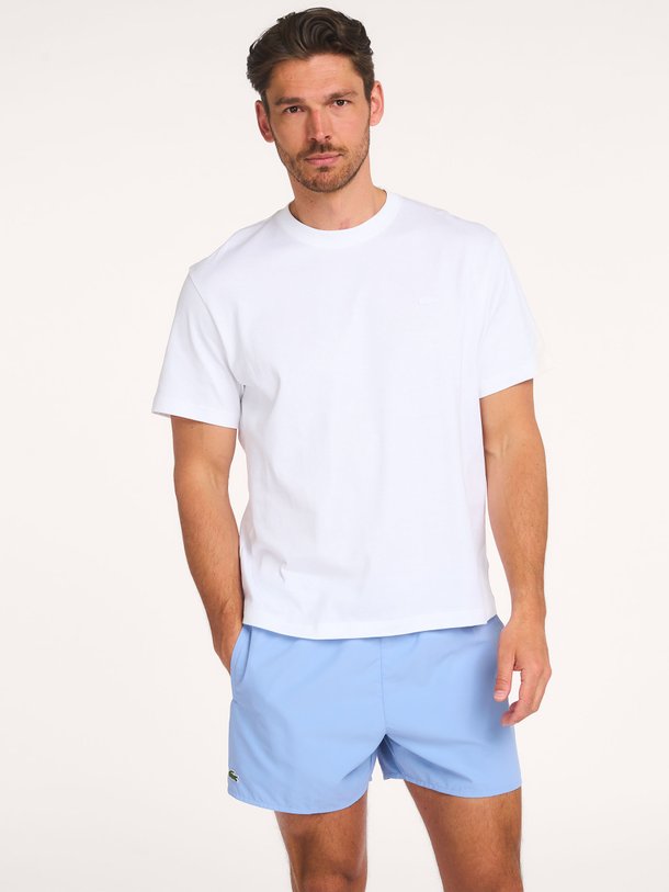 Ontdek de Katoenen logo T-shirt van Lacoste in de kleur Wit bij Orangebag. Op werkdagen voor 21:45 besteld, morgen in huis.